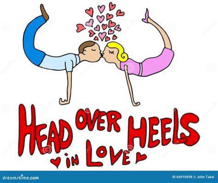 Head ___ heels in love