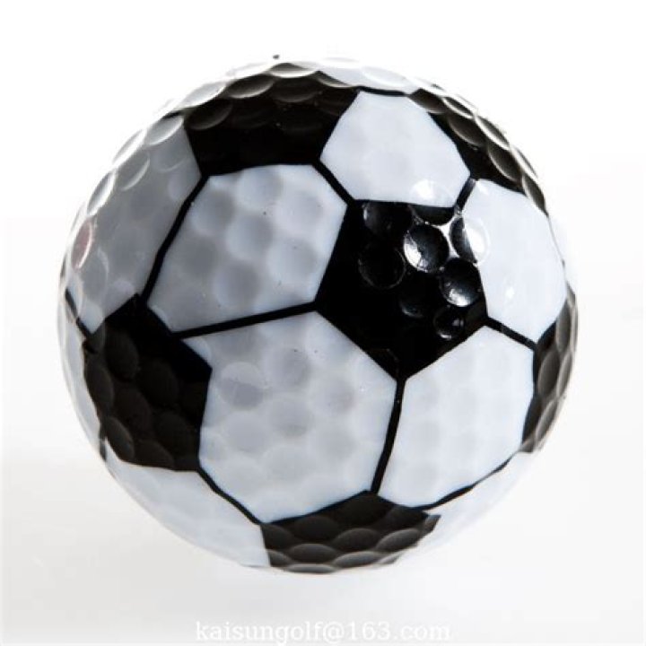 Support for a football or golf ball